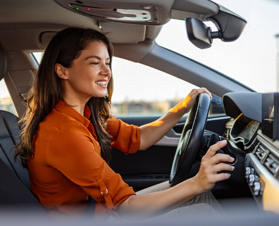 Trust My Garage logo featuring a shield design with a blue and silver color scheme visually representing automotive service and reliability top ten garage services.