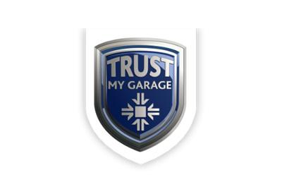 man smiling while adjusting car controls interior driving experience enjoying five advantages of comfort